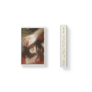 one hand on the steering wheel the other sewing a garden